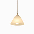 Small Alabaster Pendant Light, switched on against a plain studio background