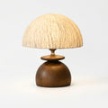 Paper Shade and Wood Table Lamp, switched on against a plain studio background