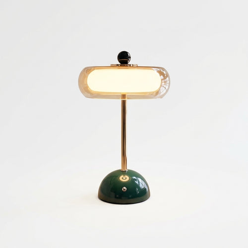 Amber Glass Tiered Cordless Lamp, switched on against a plain studio background