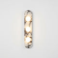 Marble and Opal Glass Wall Light, switched on against a plain studio background
