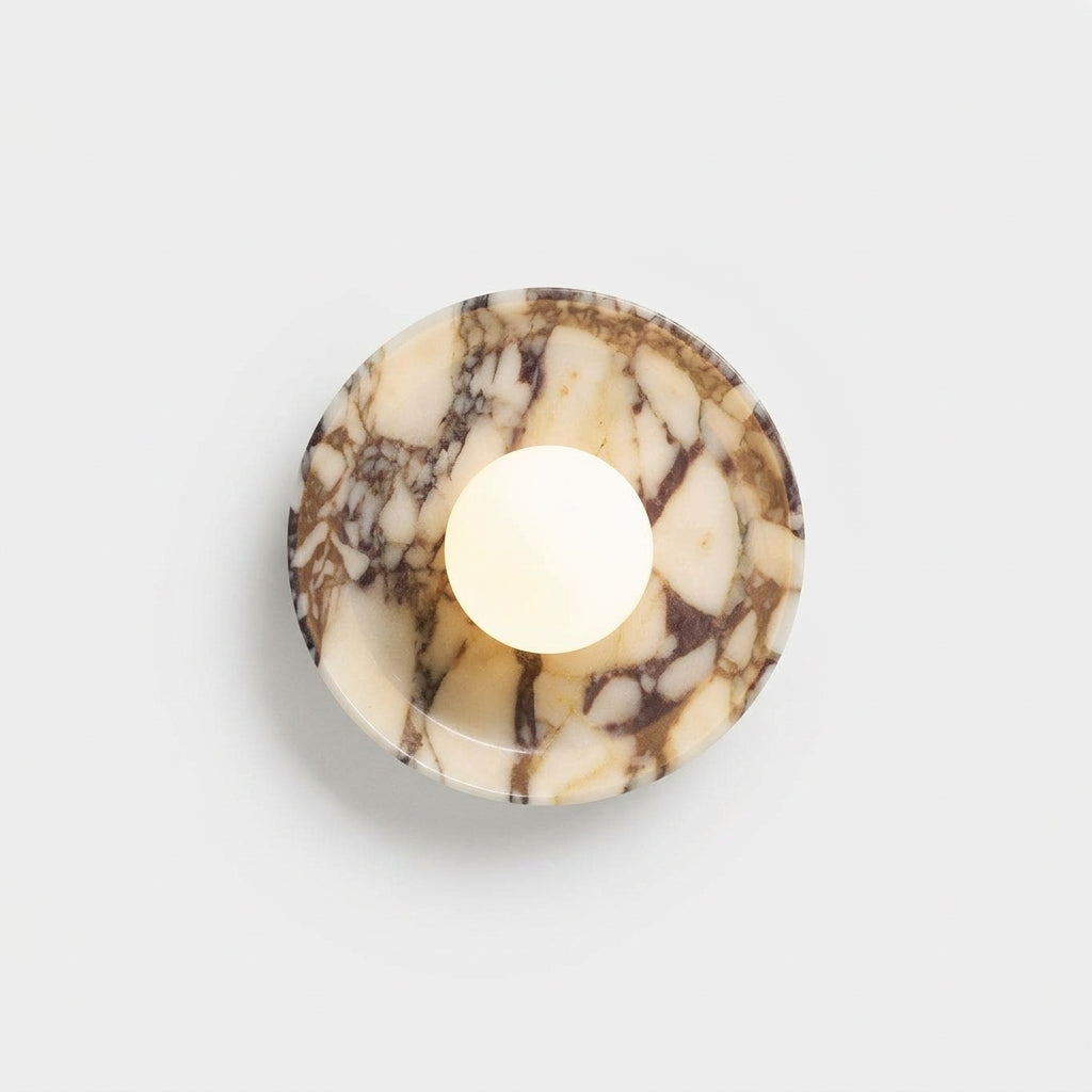 Purple Marble and Frosted Glass Wall Light, switched on against a plain studio background