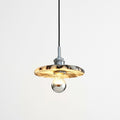 Marble Cylinder Pendant Light, switched on against a plain studio background