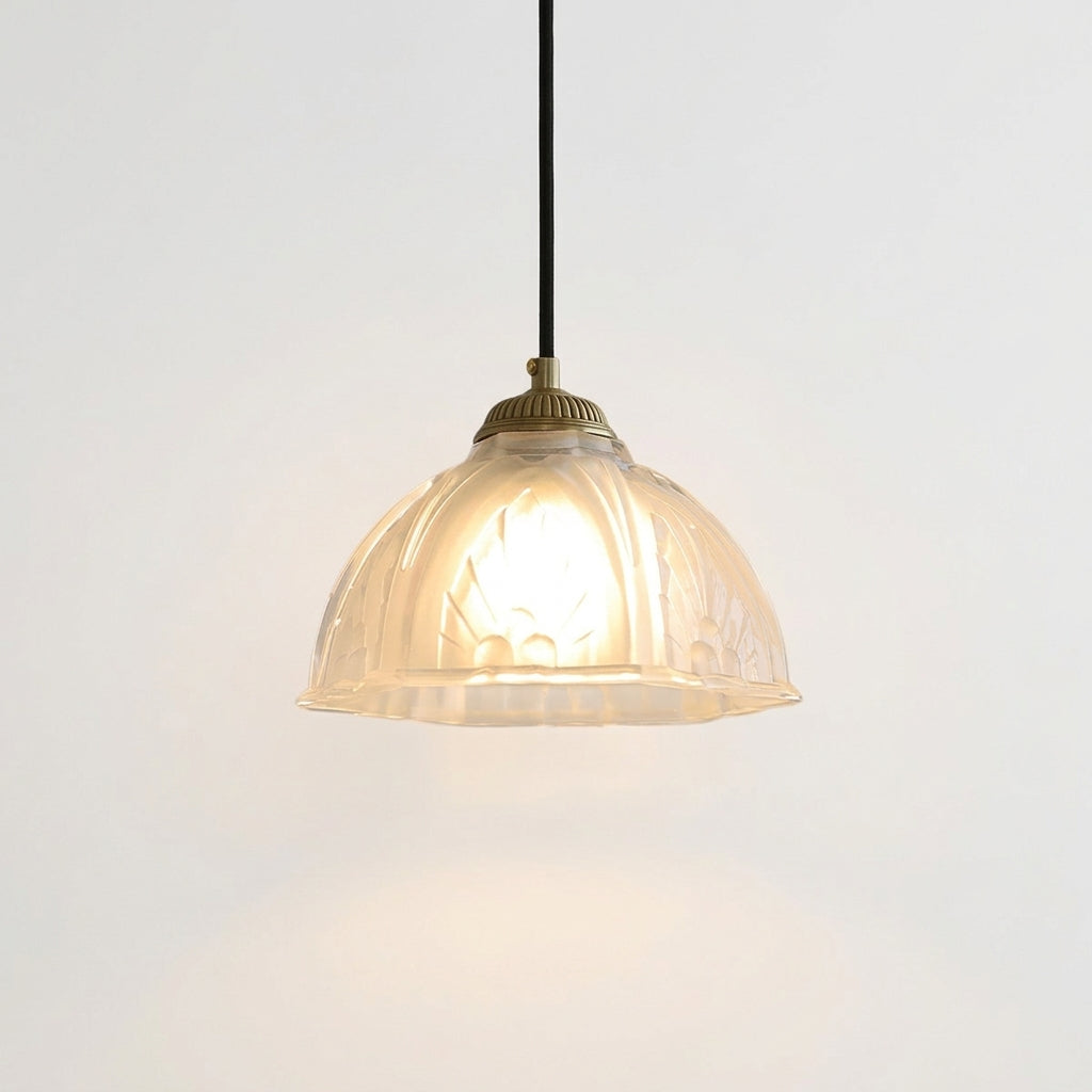 Scalloped Glass Petal Pendant Light, switched on against a plain studio background