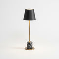 Mini Marble Stem Lamp, switched on against a plain studio background