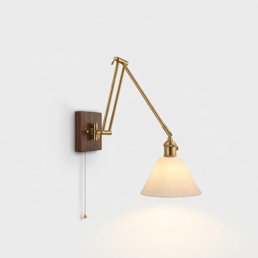 Ceramic Swing Arm Wall Sconce, switched on against a plain studio background