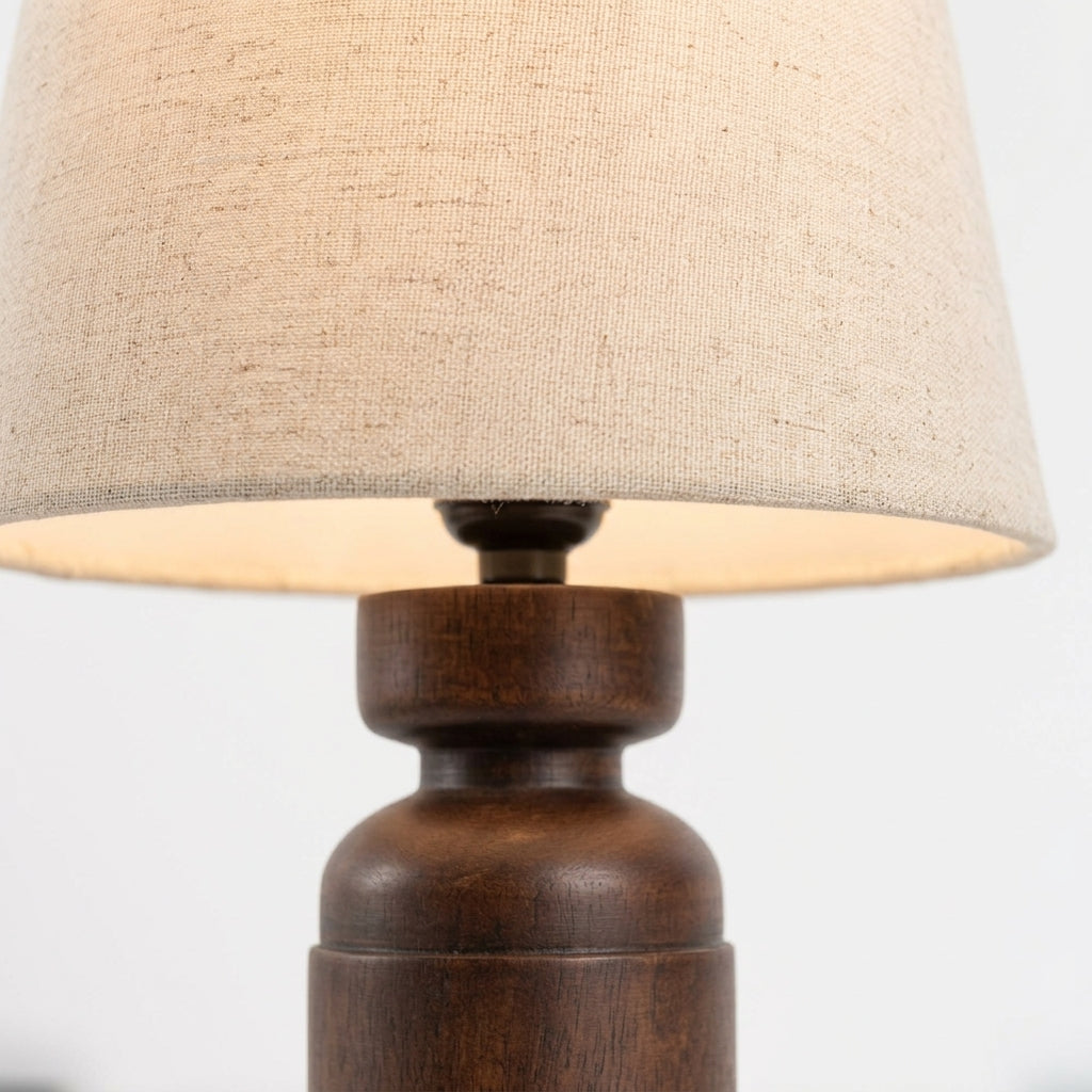 Close detail of the wood base, fabric shade on the Walnut Wood Table Lamp