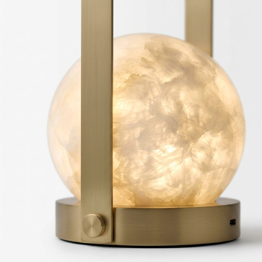 Close detail of the solid alabaster shade, brass frame on the Alabaster Portable Lantern Lamp