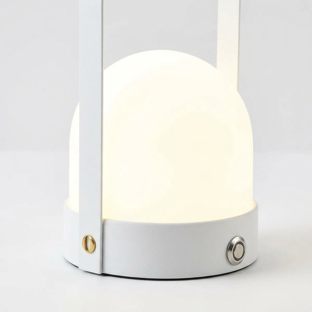 Close detail of the metal frame, glass on the Glass Lantern Portable Lamp