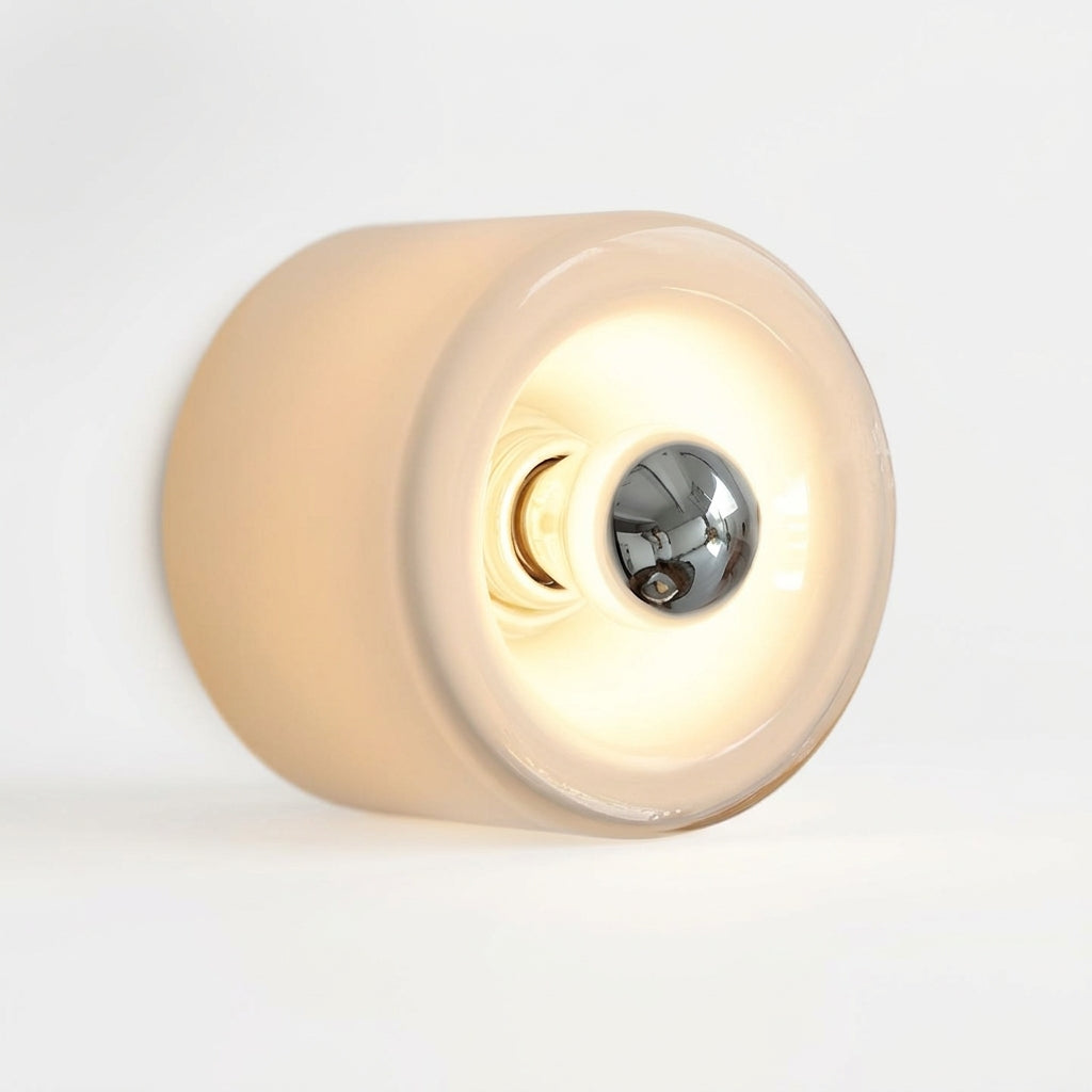 Close detail of the iron, glass on the Round Glass Wall Sconce