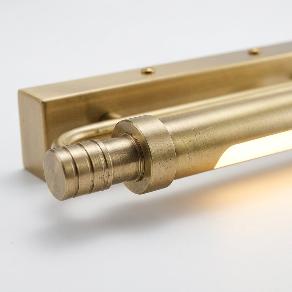 Close detail of the brass, acrylic diffuser on the Brass Linear Wall Sconce