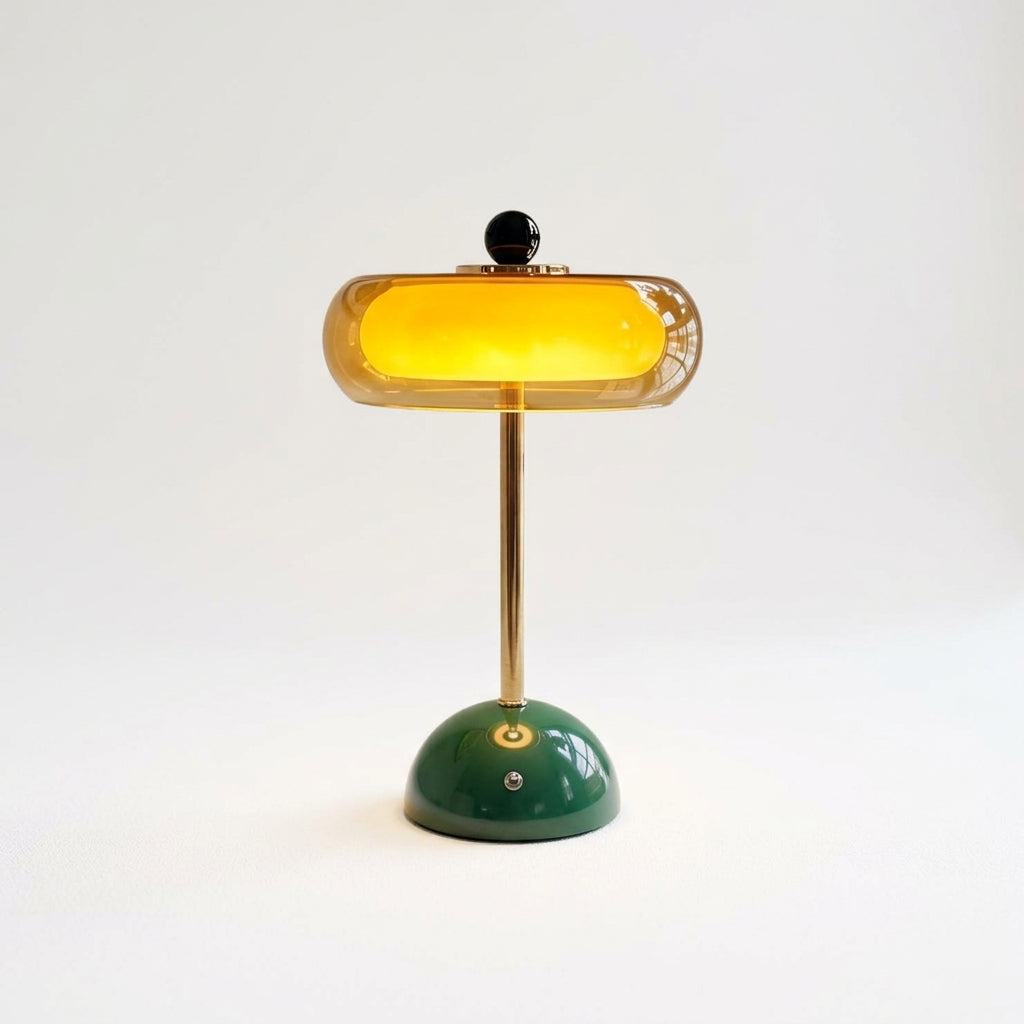 Close detail of the iron base, layered glass on the Amber Glass Tiered Cordless Lamp