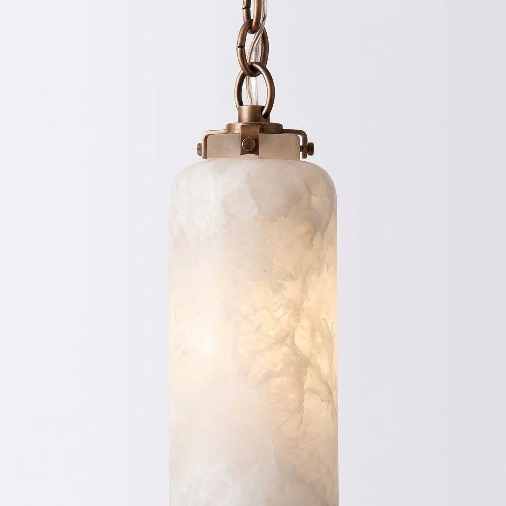 Close detail of the brass body, alabaster or glass shade on the Slim Alabaster and Brass Pendant Light