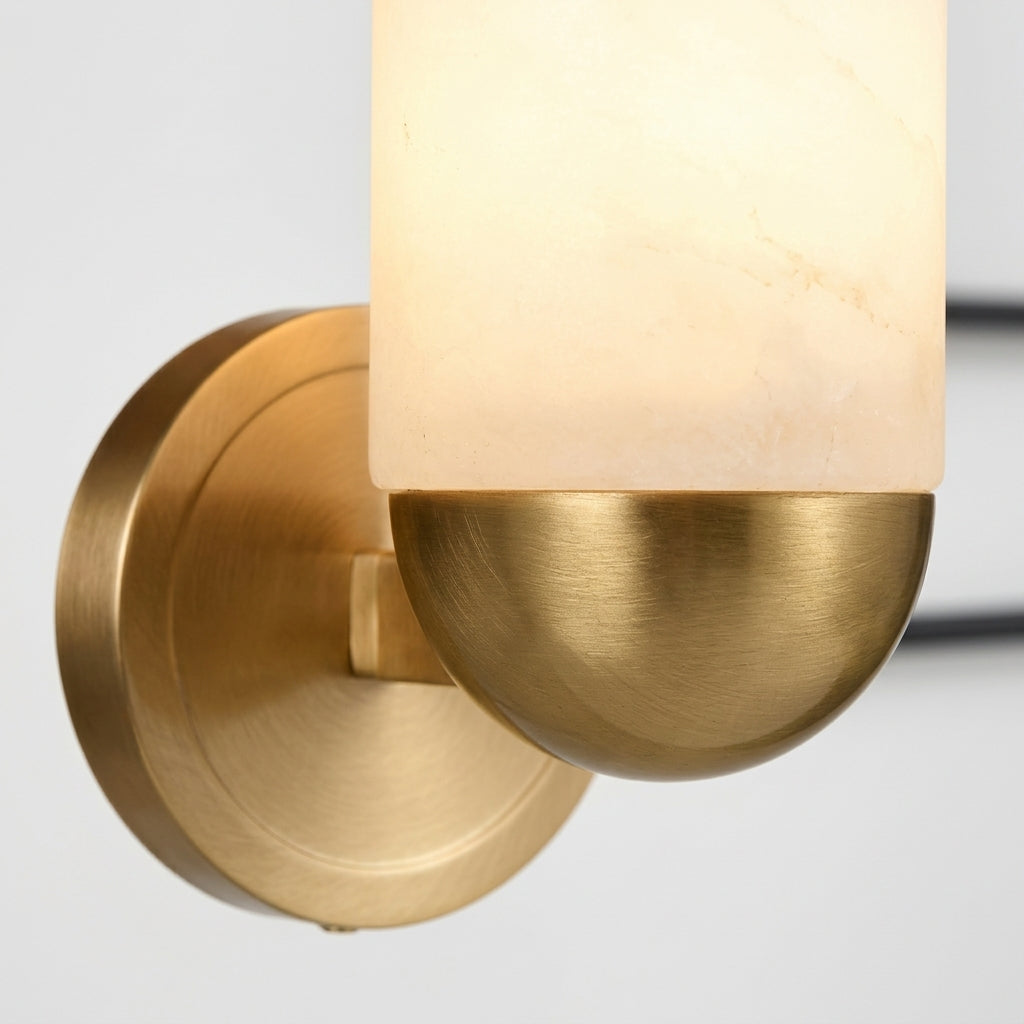 Close detail of the alabaster shade, brass body on the Alabaster Capsule Wall Light