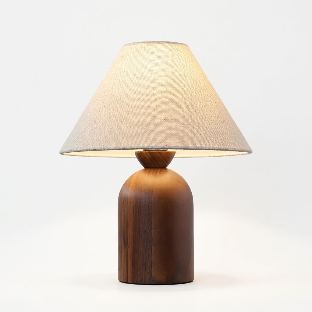 Close detail of the walnut base, linen shade on the Linen and Walnut Table Lamp