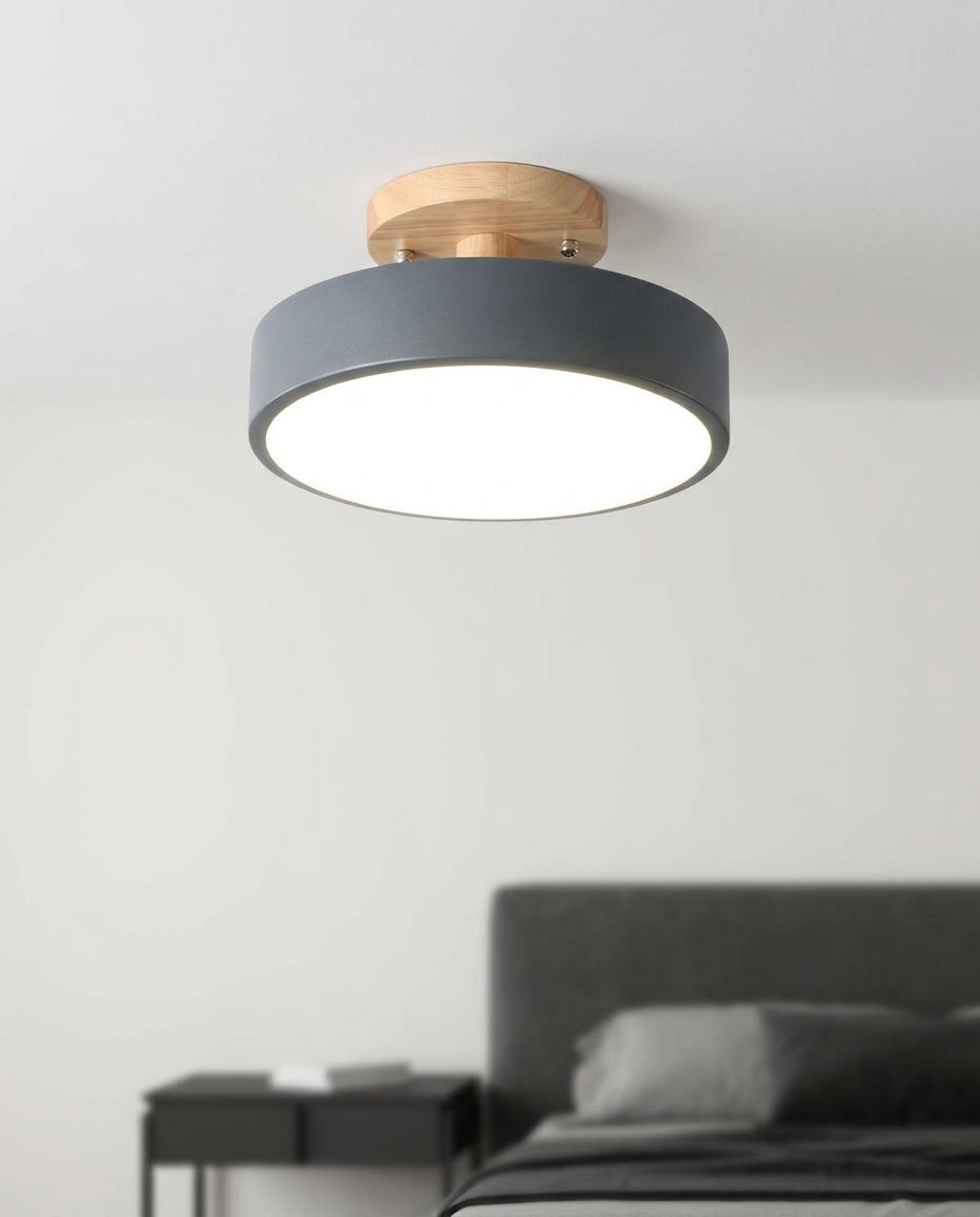 Wood and Acrylic Ceiling Light mounted on the ceiling of a calm modern bedroom, seen from below at a slight angle