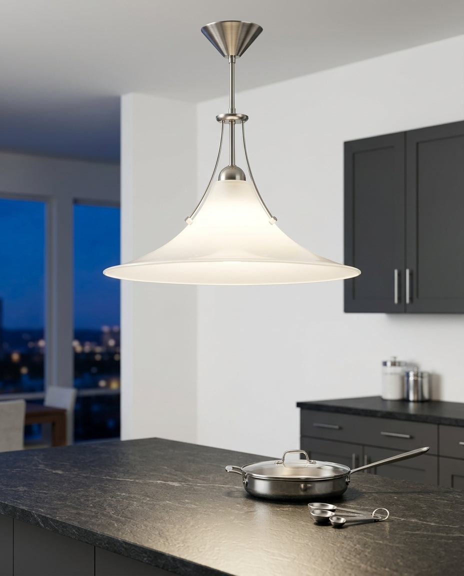 Minimalist Frosted Glass Pendant Light hanging above a kitchen island with a stone worktop, modern American kitchen, evening