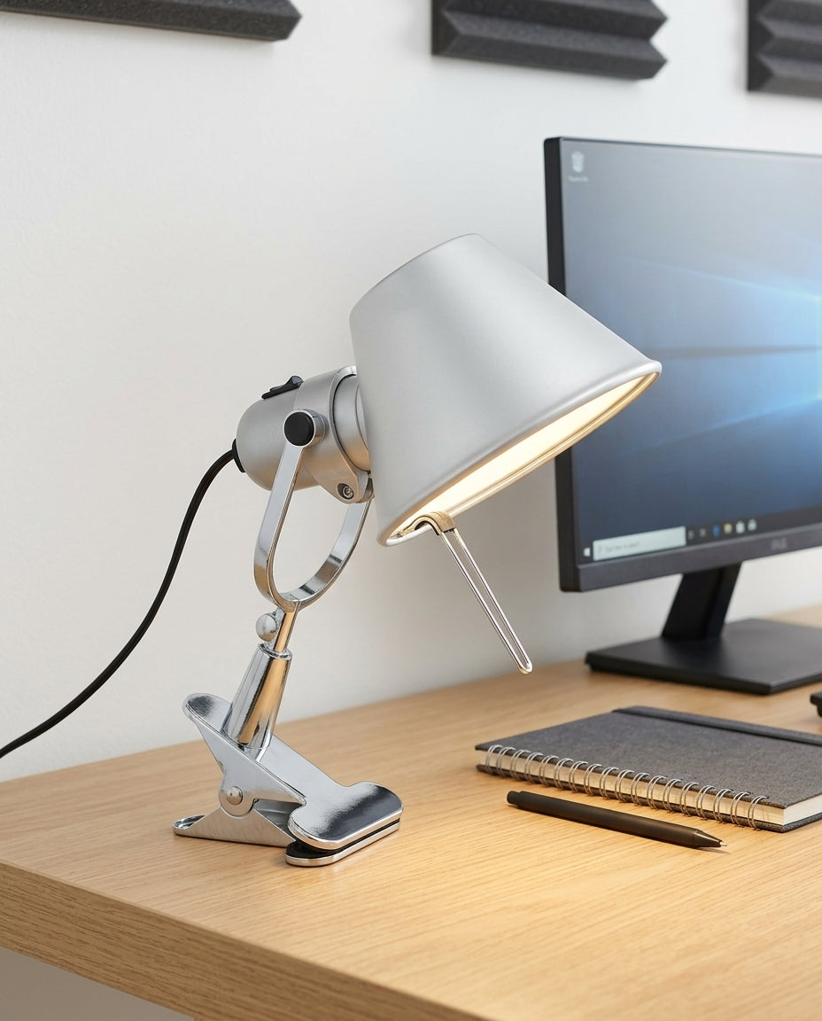 Clip-On Task Lamp on a tidy home-office desk with a monitor and a notebook, task light pooled on the desk surface