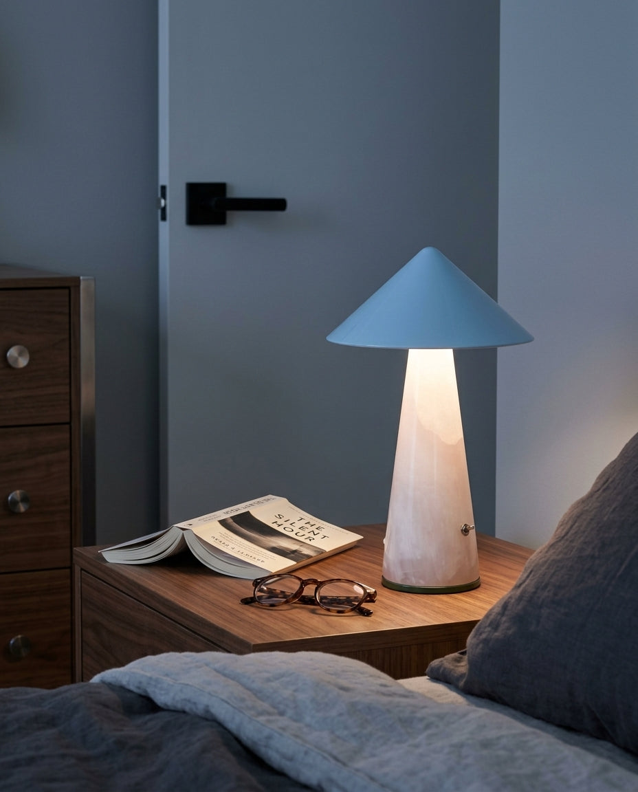 Jade Cordless Table Lamp on a bedside table beside a folded throw, warm evening light