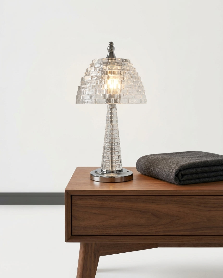 Crystal Glass Table Lamp on a bedside table beside a folded throw, warm evening light