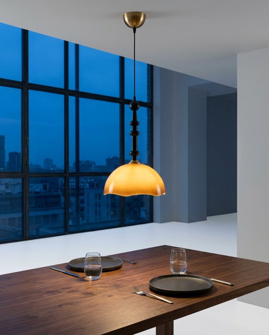 Retro Glass Dome Pendant Light hanging above a walnut dining table set for two, blue-hour light through a large window