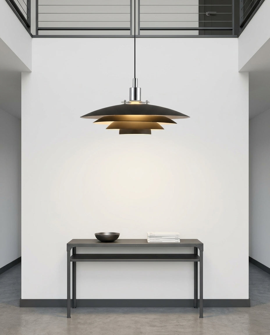 Tiered Metal Dome Pendant Light hanging in a double-height entryway above a console table, evening