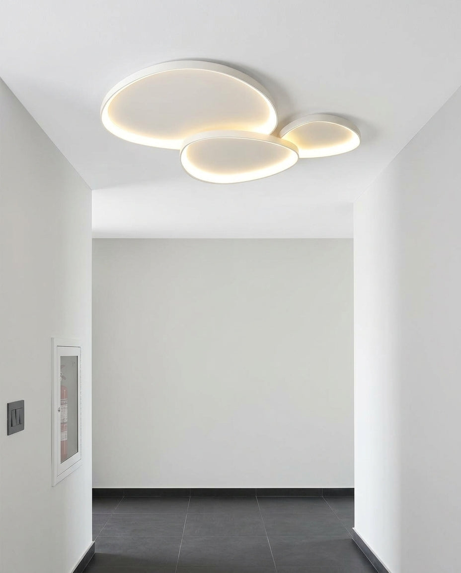 Linear Metal Ceiling Light mounted on a hallway ceiling, clean white surface, soft even light