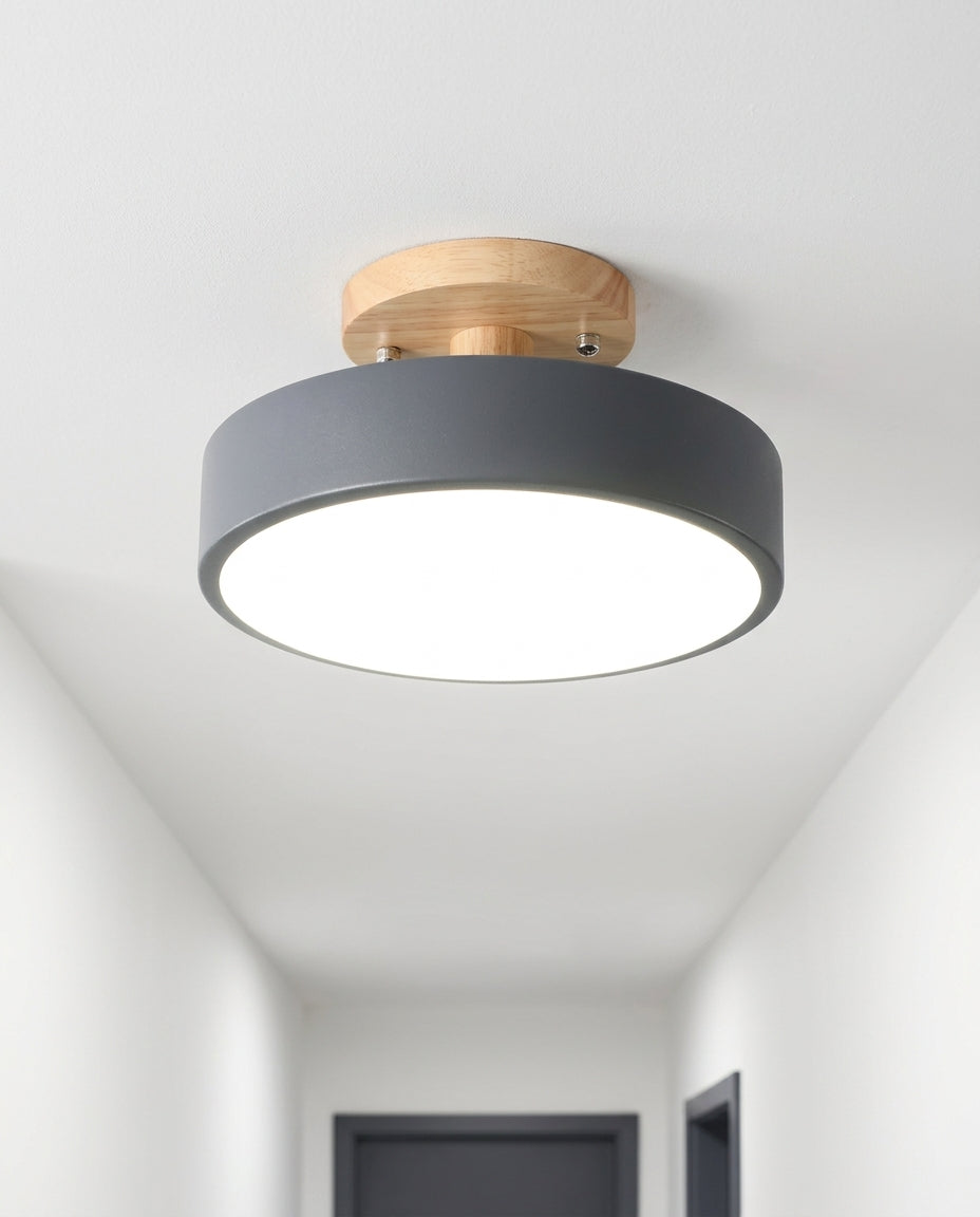 Wood and Acrylic Ceiling Light mounted on a hallway ceiling, clean white surface, soft even light
