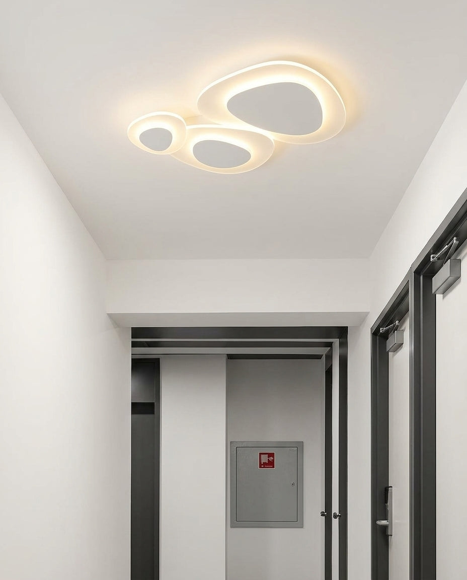 Nordic LED Flush Mount mounted on a hallway ceiling, clean white surface, soft even light